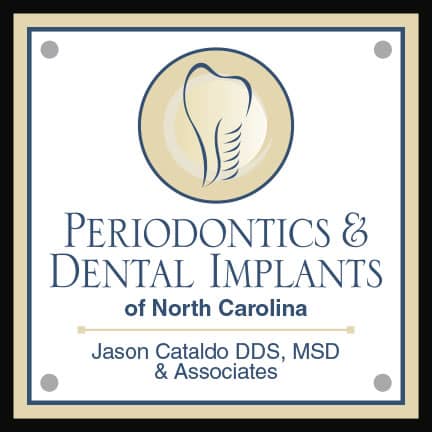 Carolina Periodontics & Dental Implants of North Carolina logo.